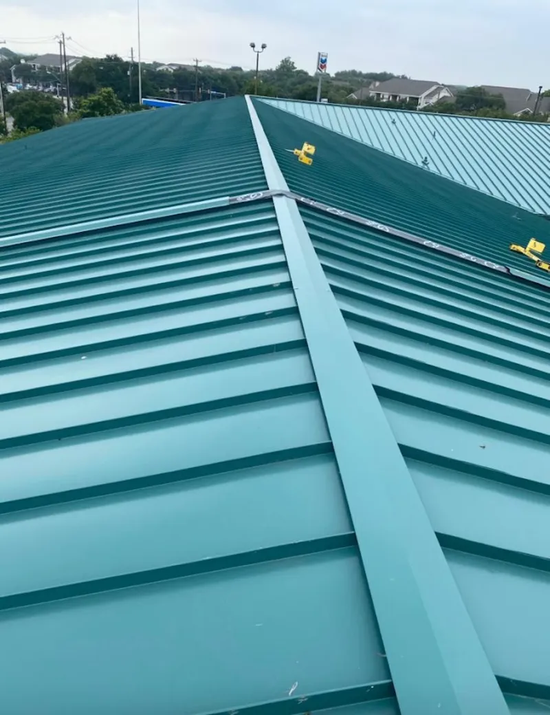 Green commercial metal roof ridge and valley for Metal Roof Repair in La Follette