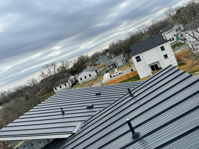 Standing seam metal roof panels with vents for Skylight Repair in La Follette